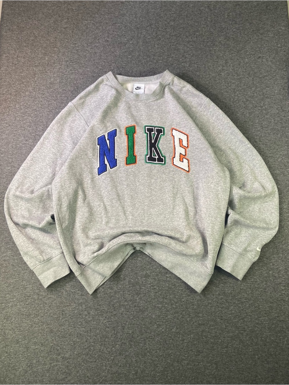 Nike Grey Sweatshirt with Blue, Green, Black and Orange Lettering